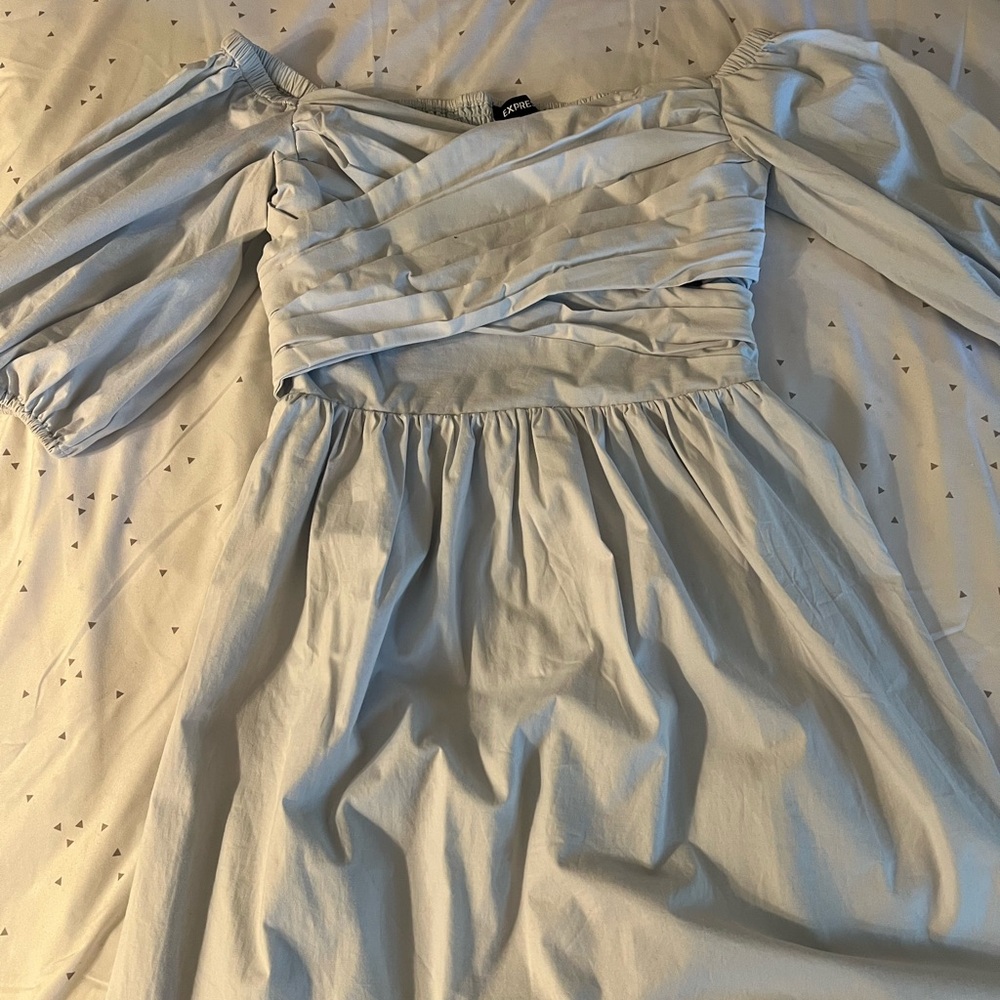 Express light blue dress with slightly puff sleeves. Worn once